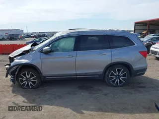 2021 Honda Pilot Elite with VIN 5FNYF6H00MB085678, listed as a IAAI auction lot 41783075 with Not Provided miles and . Bid and sale history available at DreamBid. Image 14.