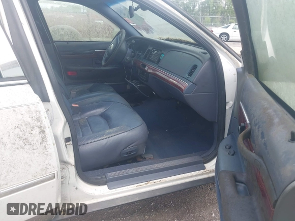 2001 Mercury Grand Marquis LS with VIN 2MEFM75WX1X633210, listed as a IAAI auction lot 42092135 with 161,963 mi miles and . Bid and sale history available at DreamBid. Image 5.