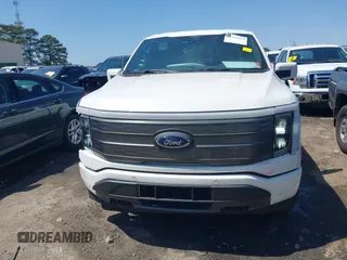 2022 Ford F-150 Lightning Pro z VIN 1FTVW1EL3NWG16227, wystawiony jako IAAI lot #41994584 z przebiegiem 23 341 mil mil oraz . Historia ofert i sprzedaży dostępna na DreamBid. Obrazek 12.