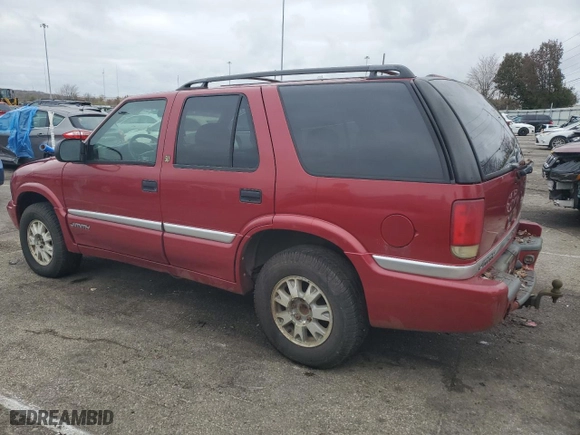 1999 GMC Jimmy SLE with VIN 1GKDT13W3X2546163, listed as a Copart auction lot 79842734 with 144,800 mi miles and Salvage Title. Bid and sale history available at carsss.com. Image 2.