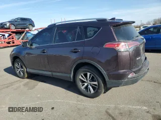 2018 Toyota RAV4 XLE with VIN 2T3WFREVXJW461897, listed as a Copart auction lot 48459355 with 159,479 mi miles and Salvage Title. Bid and sale history available at DreamBid. Image 2.