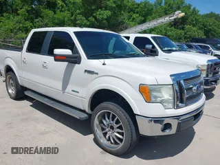 2011 Ford F-150 XLT with VIN 1FTFW1CT7BFA59275, listed as a IAAI auction lot 42111709 with 203,718 mi miles. Bid and sale history available at carsss.com. Image 1.
