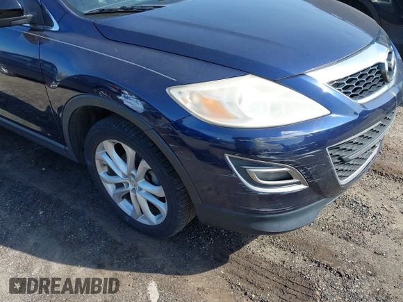 2012 Mazda CX-9 Grand Touring with VIN JM3TB3DVXC0366378, listed as a IAAI auction lot 41798606 with 143,908 mi miles. Bid and sale history available at carsss.com. Image 12.
