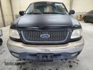 1999 Ford F-150 XL with VIN 1FTRX18L4XNB84248, listed as a Copart auction lot 52798555 with 204,943 mi miles and Salvage title. Bid and sale history available at DreamBid. Image 5.