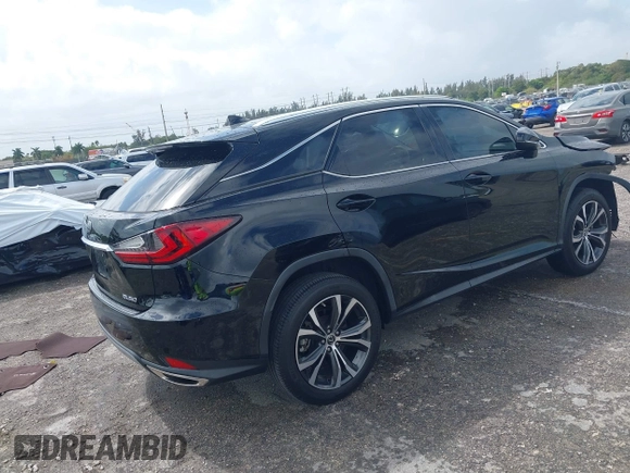 2020 Lexus RX 350 with VIN 2T2HZMAA9LC153571, listed as a IAAI auction lot 41710981 with 34,354 mi miles and . Bid and sale history available at DreamBid. Image 4.