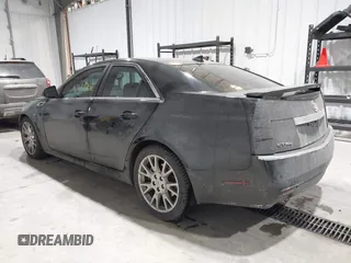 2013 Cadillac CTS Premium z VIN 1G6DS5E34D0103328, wystawiony jako IAAI lot #41501406 z przebiegiem 157 633 mil mil oraz . Historia ofert i sprzedaży dostępna na DreamBid. Obrazek 3.