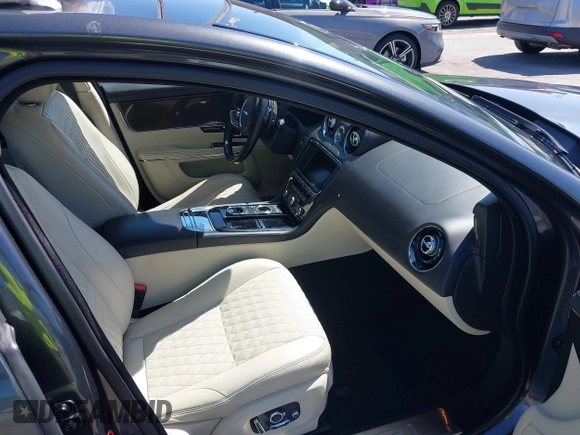 2016 Jaguar XJ Portfolio with VIN SAJWJ2GD3G8V93278, listed as a IAAI auction lot 42304155 with 52,462 mi miles and . Bid and sale history available at DreamBid. Image 5.