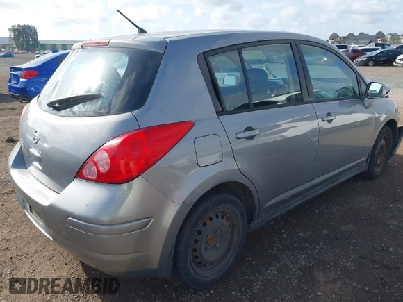 2012 Nissan Versa S with VIN 3N1BC1CPXCK229848, listed as a IAAI auction lot 41955230 with 194,702 mi miles. Bid and sale history available at carsss.com. Image 4.