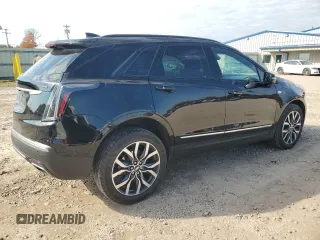 2021 Cadillac XT5 AWD Sport with VIN 1GYKNHRS3MZ103180, listed as a Copart auction lot 77166714 with 17,659 mi miles and Salvage title. Bid and sale history available at DreamBid. Image 3.