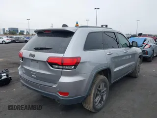2016 Jeep Grand Cherokee Laredo z VIN 1C4RJFAG3GC457431, wystawiony jako IAAI lot #41993167 z przebiegiem 61 427 mil mil oraz . Historia ofert i sprzedaży dostępna na DreamBid. Obrazek 4.