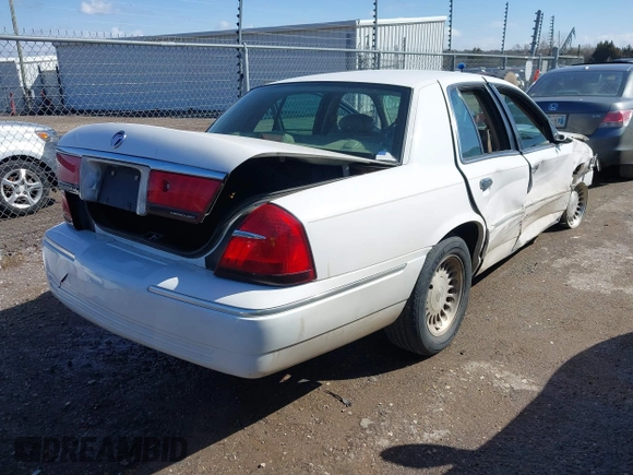 2002 Mercury Grand Marquis LS Premium z VIN 2MEFM75W92X641347, wystawiony jako IAAI lot #41701179 z przebiegiem 79 942 mil mil oraz . Historia ofert i sprzedaży dostępna na DreamBid. Obrazek 4.