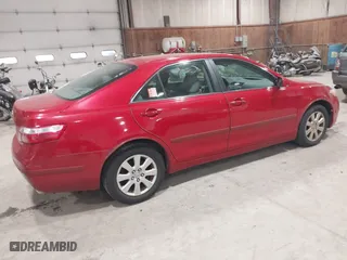 2008 Toyota Camry LE with VIN 4T1BK46K18U071033, listed as a IAAI auction lot 42071067 with 228,818 mi miles. Bid and sale history available at carsss.com. Image 4.