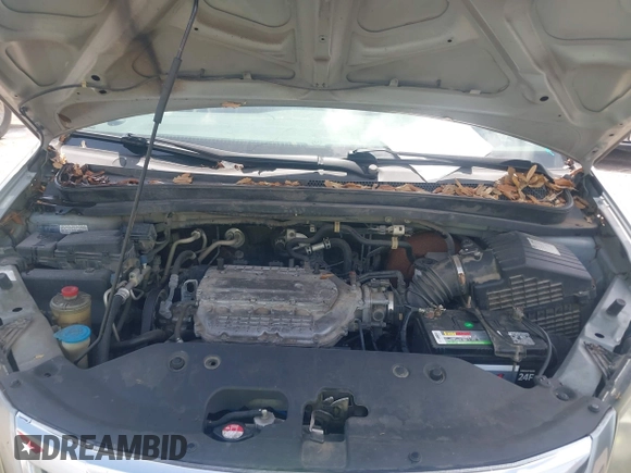 2010 Honda Odyssey EX with VIN 5FNRL3H42AB002679, listed as a IAAI auction lot 42692701 with 179,905 mi miles and . Bid and sale history available at DreamBid. Image 10.