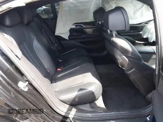 2017 BMW 7 Series 750i with VIN WBA7F0C37HGM22205, listed as a IAAI auction lot 40033800 with 70,581 mi miles. Bid and sale history available at carsss.com. Image 8.