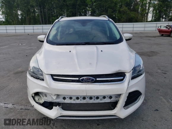 2016 Ford Escape Titanium with VIN 1FMCU9J91GUB52418, listed as a Copart auction lot 52644135 with 107,212 mi miles and Salvage Title. Bid and sale history available at carsss.com. Image 5.