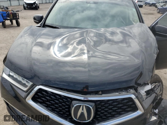 2020 Acura MDX Technology z VIN 5J8YD3H58LL007727, wystawiony jako Copart lot #45608205 z przebiegiem 42 627 mil mil oraz Nie do naprawy • Non repairable. Historia ofert i sprzedaży dostępna na DreamBid. Obrazek 14.