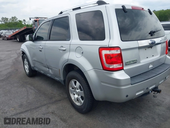 2010 Ford Escape Limited z VIN 1FMCU0E72AKD30702, wystawiony jako IAAI lot #42093802 z przebiegiem 155 572 mil mil oraz . Historia ofert i sprzedaży dostępna na DreamBid. Obrazek 3.