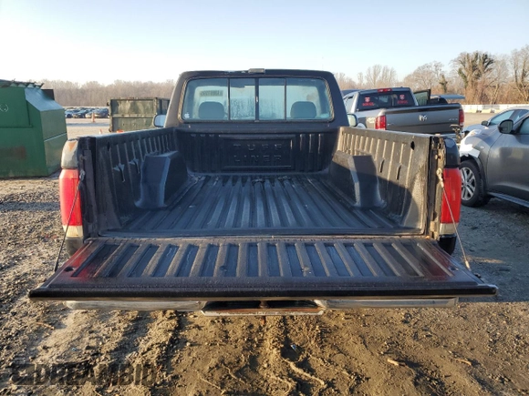1990 Ford F-150 "S" with VIN 1FTDF15YXLNB40987, listed as a Copart auction lot 43691595 with 33,397 mi miles and Salvage Title. Bid and sale history available at carsss.com. Image 6.