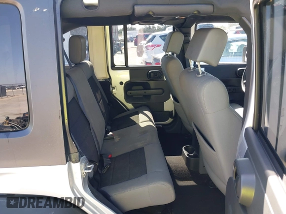 2010 Jeep Wrangler Unlimited Sport with VIN 1J4BA3H17AL211887, listed as a IAAI auction lot 41778324 with 185,626 mi miles. Bid and sale history available at carsss.com. Image 8.