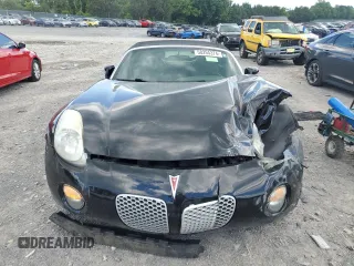 2006 Pontiac Solstice z VIN 1G2MB35B76Y113840, wystawiony jako Copart lot #58294374 z przebiegiem 83 511 mil mil oraz Szkoda całkowita • Salvage title. Historia ofert i sprzedaży dostępna na DreamBid. Obrazek 5.