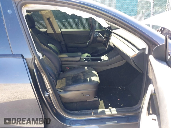 2021 Tesla Model Y Performance with VIN 5YJYGDEF1MF268405, listed as a IAAI auction lot 41818331 with 43,621 mi miles and . Bid and sale history available at DreamBid. Image 5.