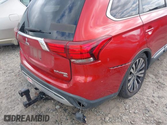 2019 Mitsubishi Outlander SE z VIN JA4AD3A30KZ033978, wystawiony jako IAAI lot #42315448 z przebiegiem 131 906 mil mil oraz . Historia ofert i sprzedaży dostępna na DreamBid. Obrazek 19.