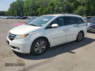 2014 Honda Odyssey Touring with VIN 5FNRL5H93EB041813, listed as a Copart auction lot 63920265 with 153,405 mi miles and Clean title. Bid and sale history available at DreamBid. Image 1.