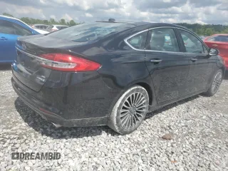 2018 Ford Fusion SE z VIN 3FA6P0LU6JR273861, wystawiony jako Copart lot #55722005 z przebiegiem 127 633 mil mil oraz Szkoda całkowita • Salvage title. Historia ofert i sprzedaży dostępna na DreamBid. Obrazek 3.
