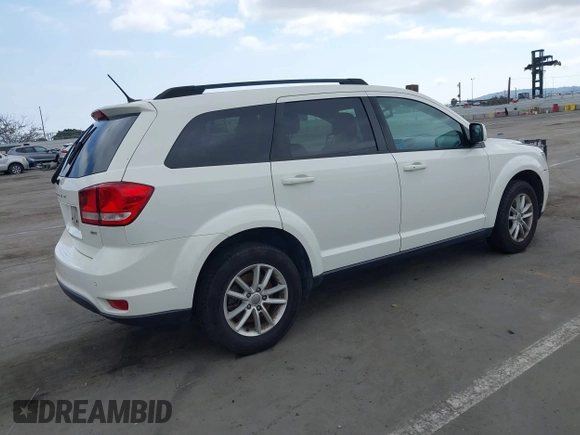 2015 Dodge Journey SXT with VIN 3C4PDDBG9FT606686, listed as a IAAI auction lot 42048201 with 107,593 mi miles and . Bid and sale history available at DreamBid. Image 4.