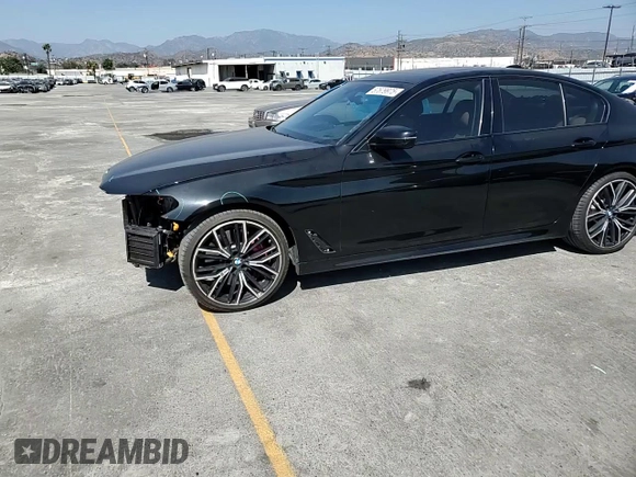 2021 BMW 5 Series 540i with VIN WBA53BJ05MWW92487, listed as a Copart auction lot 57679975 with 53,311 mi miles and Salvage title. Bid and sale history available at DreamBid. Image 14.