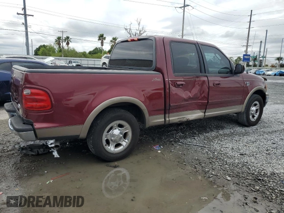 2003 Ford F-150 XLT with VIN 1FTRW07673KA75061, listed as a Copart auction lot 52034595 with Not Provided miles and Salvage Title. Bid and sale history available at carsss.com. Image 3.