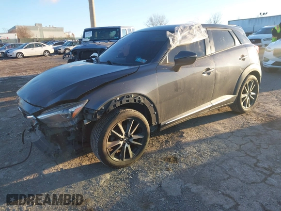 2016 Mazda CX-3 Grand Touring with VIN JM1DKBD74G0115936, listed as a IAAI auction lot 41296104 with 191,408 mi miles. Bid and sale history available at carsss.com. Image 2.