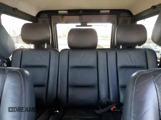2002 Mercedes-Benz G-Class with VIN WDCYR49E32X133189, listed as a Copart auction lot 80421774 with 138,649 mi miles and Clean Title. Bid and sale history available at carsss.com. Image 10.