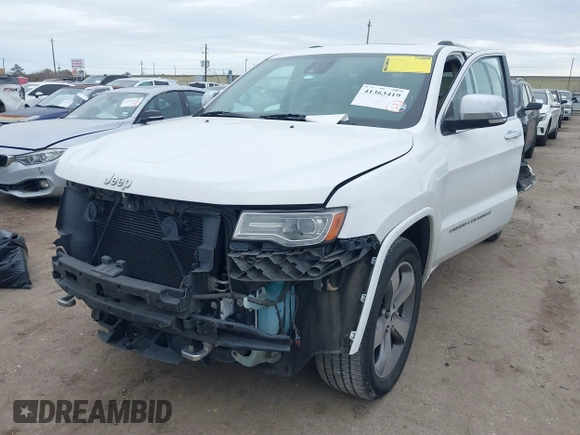 2014 Jeep Grand Cherokee Overland with VIN 1C4RJECG3EC266659, listed as a IAAI auction lot 41363419 with 142,896 mi miles. Bid and sale history available at carsss.com. Image 18.