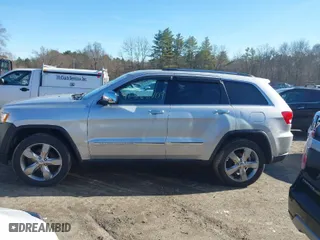 2013 Jeep Grand Cherokee Limited with VIN 1C4RJFBG5DC634023, listed as a IAAI auction lot 41828704 with 132,286 mi miles. Bid and sale history available at carsss.com. Image 14.