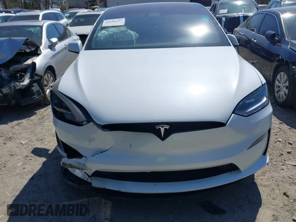 2023 Tesla Model X with VIN 7SAXCDE50PF414198, listed as a IAAI auction lot 41880957 with Not Provided miles and . Bid and sale history available at DreamBid. Image 6.