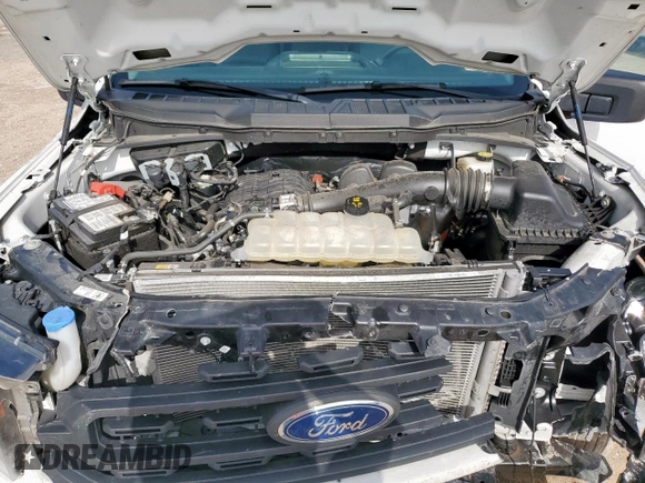 2023 Ford F-150 XL с VIN 1FTEW1CB7PKF35512, выставлен на аукционе Copart как лот 63042965 с пробегом 72 721 миль миль и Списание • Salvage title. История ставок и продаж доступна на DreamBid. Изображение 11.