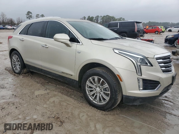 2017 Cadillac XT5 Luxury FWD with VIN 1GYKNBRS5HZ123174, listed as a Copart auction lot 43193045 with 96,617 mi miles and Salvage Title. Bid and sale history available at DreamBid. Image 4.