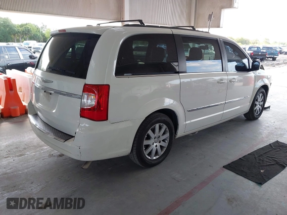 2013 Chrysler Town & Country Touring with VIN 2C4RC1BG0DR675406, listed as a IAAI auction lot 42119645 with 166,679 mi miles and . Bid and sale history available at DreamBid. Image 4.