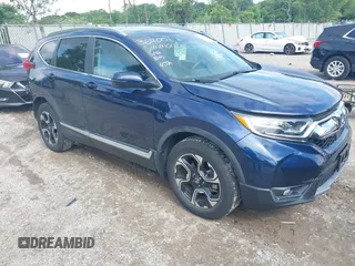 2019 Honda CR-V Touring with VIN 2HKRW2H97KH640149, listed as a IAAI auction lot 42371670 with 31,474 mi miles and . Bid and sale history available at DreamBid. Image 1.