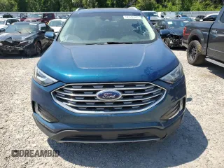2020 Ford Edge SEL z VIN 2FMPK3J9XLBA59093, wystawiony jako Copart lot #52542645 z przebiegiem 128 059 mil mil oraz Czysty tytuł • Clean title. Historia ofert i sprzedaży dostępna na DreamBid. Obrazek 5.
