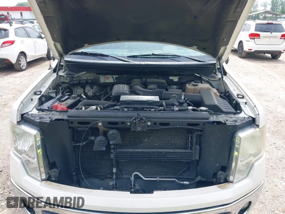 2009 Ford F-150 XL z VIN 1FTPW14V19FB19582, wystawiony jako IAAI lot #42354741 z przebiegiem 132 074 mil mil oraz . Historia ofert i sprzedaży dostępna na DreamBid. Obrazek 10.