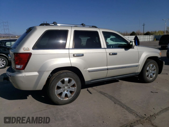 2010 Jeep Grand Cherokee Limited with VIN 1J4RR5GT3AC135686, listed as a Copart auction lot 52961465 with 136,034 mi miles and Salvage title. Bid and sale history available at DreamBid. Image 3.