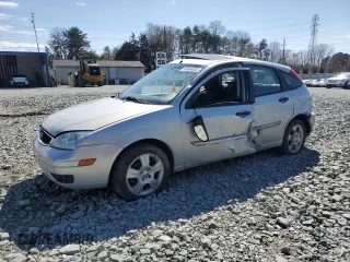 2007 Ford Focus S z VIN 1FAFP37N07W227288, wystawiony jako Copart lot #49164855 z przebiegiem 103 843 mil mil oraz Szkoda całkowita • Salvage title. Historia ofert i sprzedaży dostępna na DreamBid. Obrazek 1.
