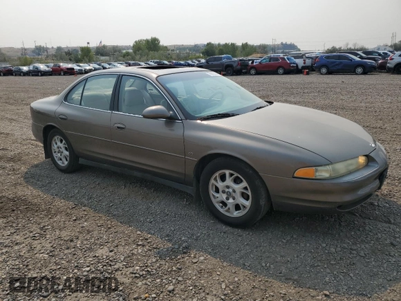 2000 Oldsmobile Intrigue GL z VIN 1G3WS52H4YF210758, wystawiony jako Copart lot #70872454 z przebiegiem 103 298 mil mil oraz Tytuł czysty. Historia ofert i sprzedaży dostępna na DreamBid. Obrazek 4.