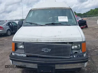 1991 Chevrolet Astro Cargo z VIN 1GBDM19Z7MB202913, wystawiony jako IAAI lot #42363530 z przebiegiem 191 695 mil mil oraz . Historia ofert i sprzedaży dostępna na DreamBid. Obrazek 6.