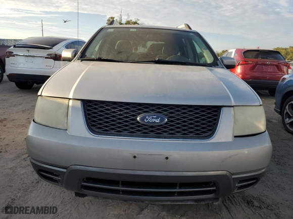 2007 Ford Freestyle SEL with VIN 1FMDK02177GA39019, listed as a Copart auction lot 73844164 with 185,083 mi miles and Salvage Title. Bid and sale history available at carsss.com. Image 5.