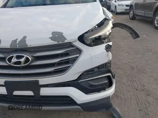 2017 Hyundai Santa Fe 2.4L z VIN 5XYZT3LB2HG412388, wystawiony jako IAAI lot #41174620 z przebiegiem 122 237 mil mil oraz . Historia ofert i sprzedaży dostępna na DreamBid. Obrazek 17.