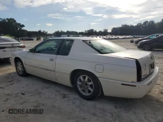 2001 Cadillac Eldorado Touring ETC z VIN 1G6ET12931B103758, wystawiony jako Copart lot #73787764 z przebiegiem Nie podano mil oraz Szkody całkowita. Historia ofert i sprzedaży dostępna na DreamBid. Obrazek 2.