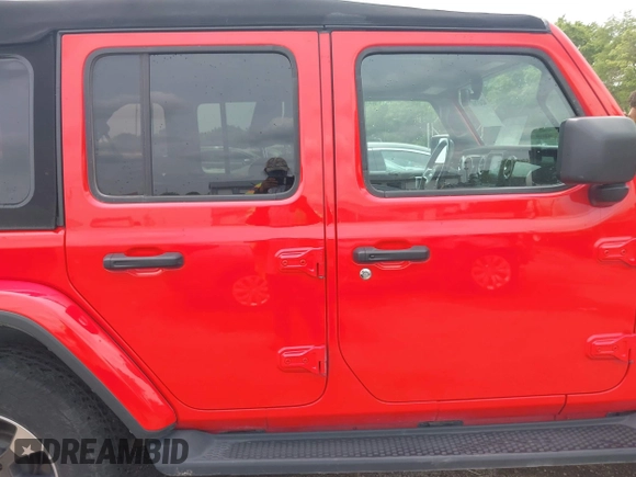 2018 Jeep Wrangler Unlimited Sahara z VIN 1C4HJXEG4JW316496, wystawiony jako IAAI lot #42437607 z przebiegiem 46 861 mil mil oraz . Historia ofert i sprzedaży dostępna na DreamBid. Obrazek 13.